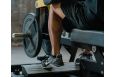 Нагружаемый дисками тренажер Technogym PURE STRENGTH Seated Calf фото 1